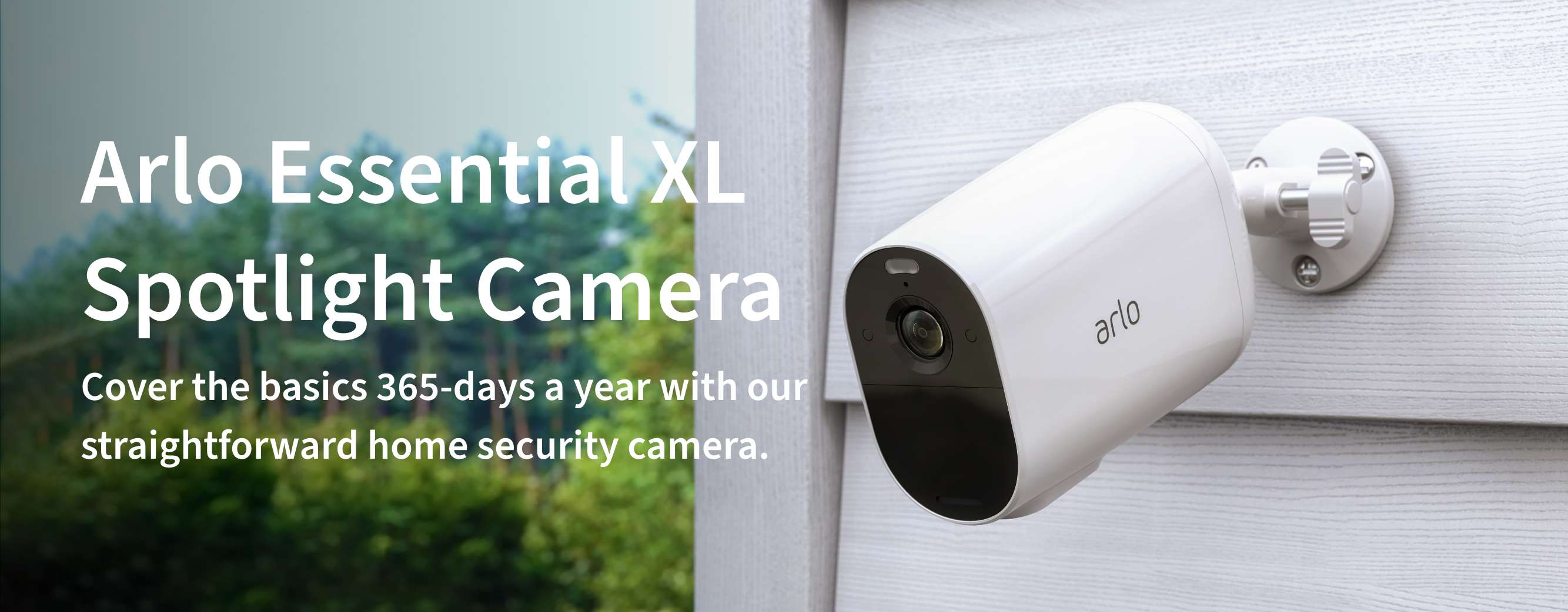 An Arlo Essential XL security camera outside on a fence, gives you straightforward home security
