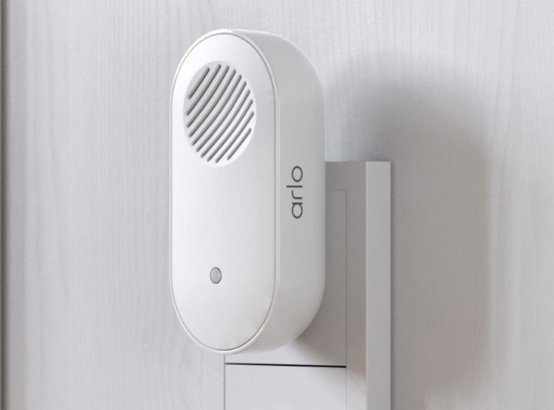 An image shows an Arlo Chime 2 on the wall